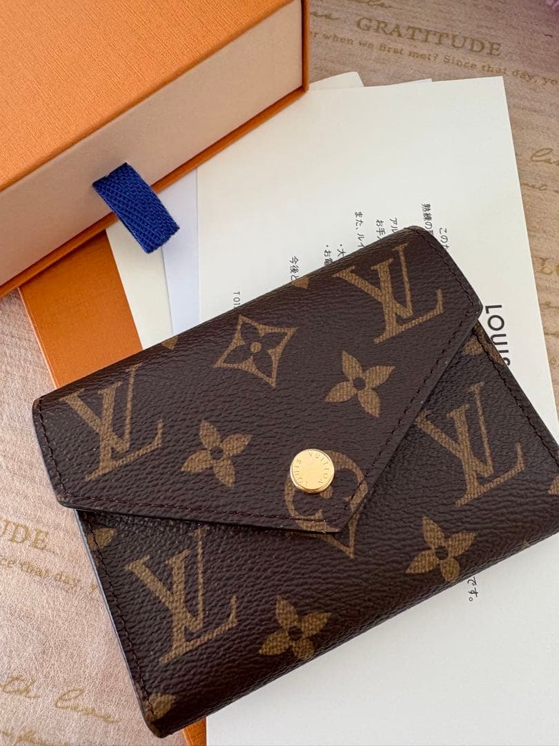 LOUIS VUITTON ポルトフォイユ・ヴィクトリーヌモノグラム　ピンク