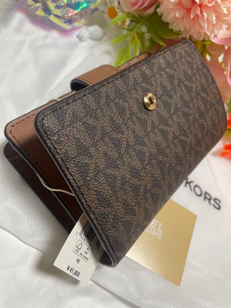 バ*。様 ❤️[新品、未使用]❤️Michael Kors 二つ折りシグネチャー