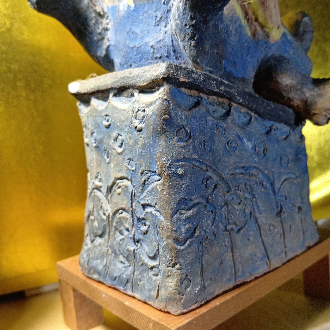 亀の上に立つ人物像 置物