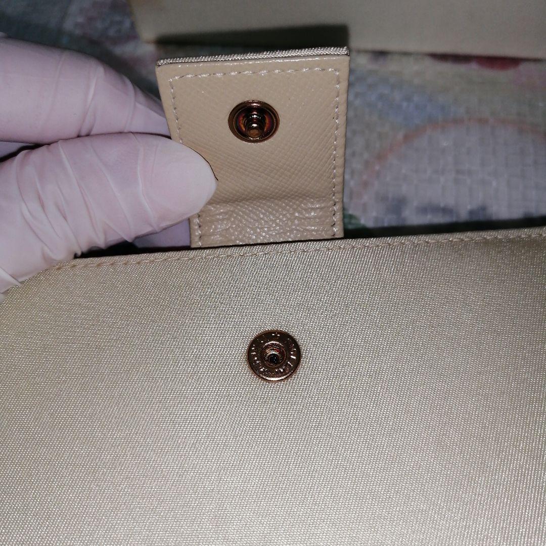 【未使用美品】 PRADA 三つ折り財布 テスート ゴールド ベージュ 三角ロゴ