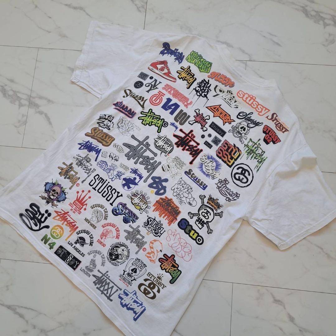 STUSSYステューシー 総柄Tシャツ オール歴代ロゴ 両面プリント Y2K L