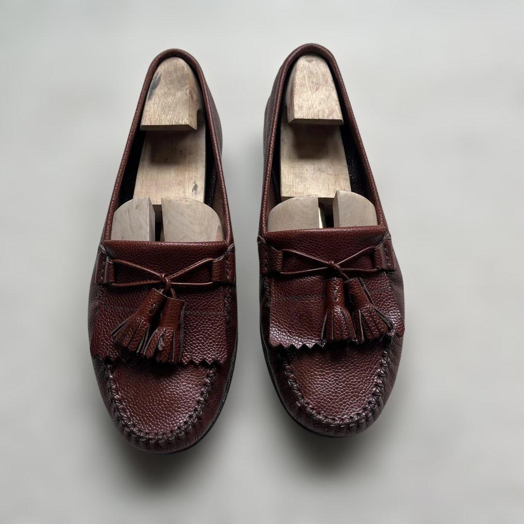 フェラガモ ダークブラウン タッセル付きレザー モカシン